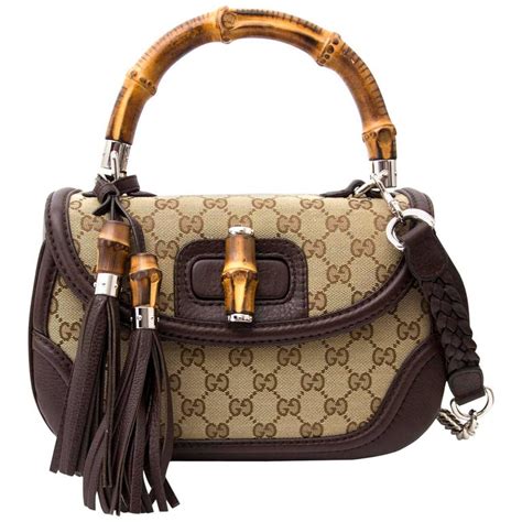 gucci bamboo top handle tote|gucci monogram bamboo handle bag.